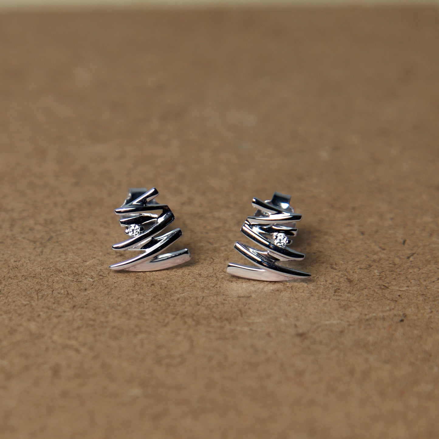 Sterling Connected Solitaire Earrings In Silver