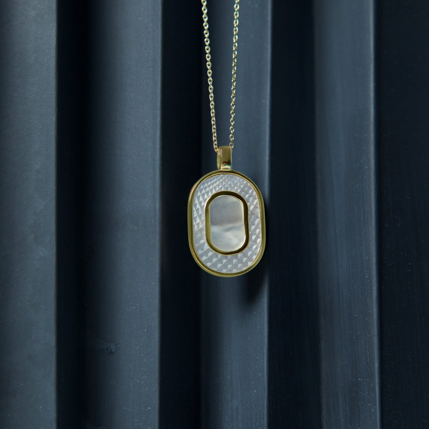 Kate Designer Mother Of Pearl Pendant- 18K Gold Plated. Plated with 18k gold, the Kate designer pearl pendant is a captivatin...