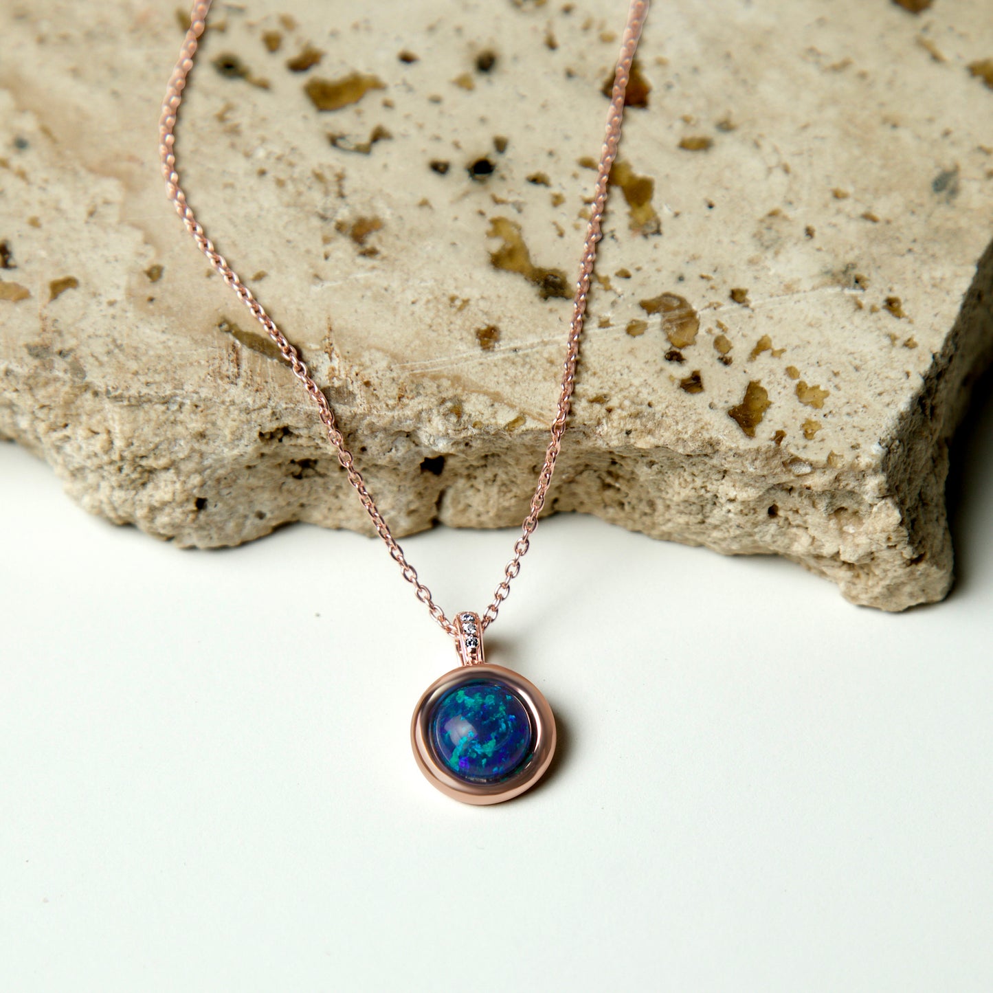 Stargazing Australian Blue Fiery Opal-18K Rose Gold Plated. The Australian Blue opal at the heart of the pendant mirrors the ...